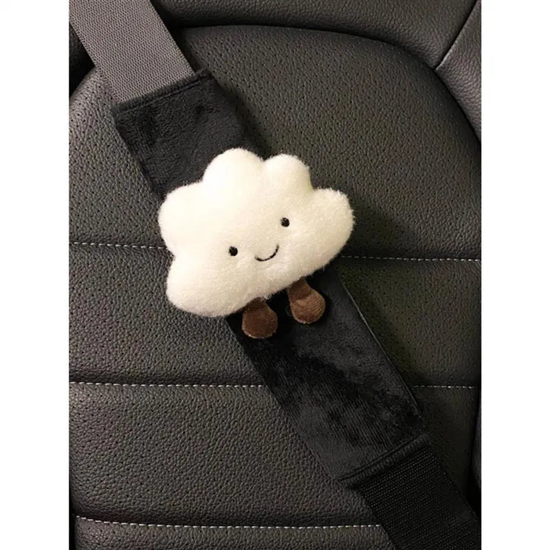 Creative cartoon plush universal automobile seat belt shoulder protector in big-eyed panda design on a grey car seat belt