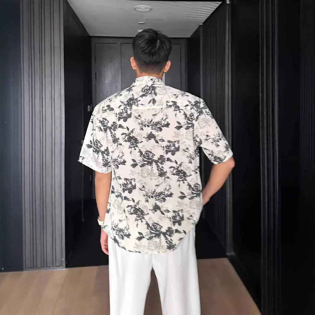 Men's loose fit short sleeve shirt with floral print in black or white colour options