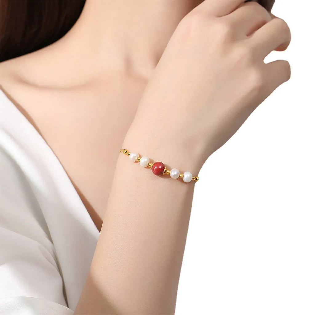 Yellow retro-style bracelet with red bean and cinnabar design on 925 silver band.
