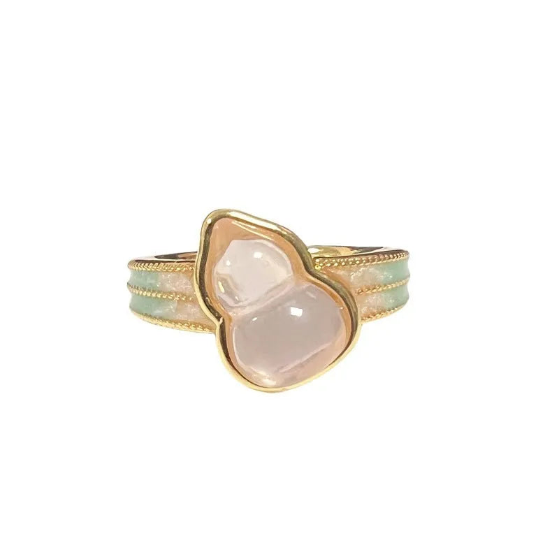 Adjustable copper ring with vintage gourd, flower, and bow design, inlaid with zircon stones.