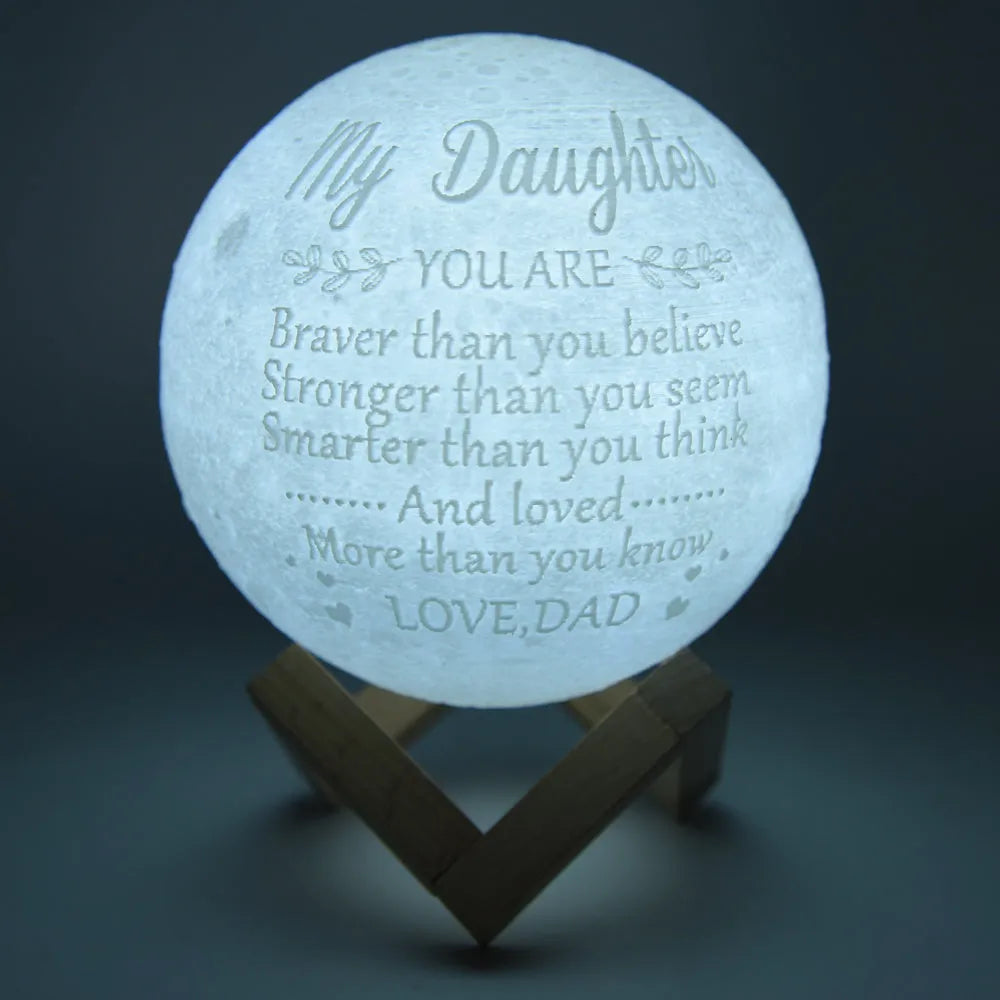 15cm 3-colour LED moon light with 3D printed plastic shade on a bedside table, touch control at base