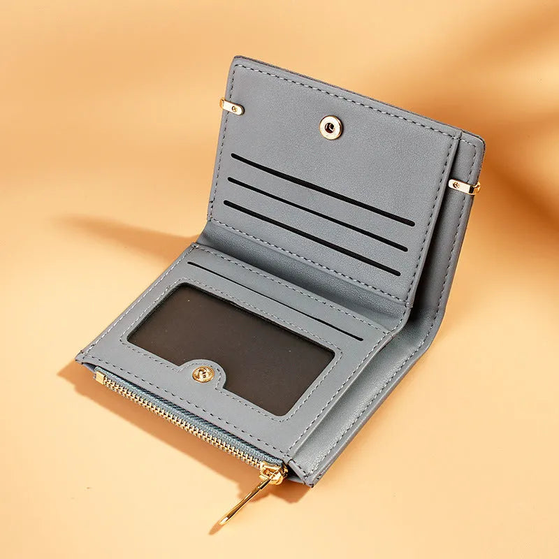 Ladies foldable wallet with zip closure showing multiple internal card slots and compartments
