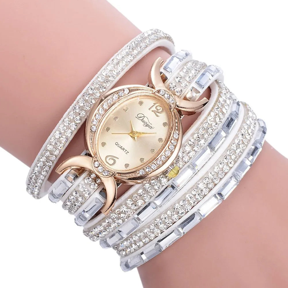 New casual rhinestone watch for women with round stainless steel case, leather band, and analog quartz movement