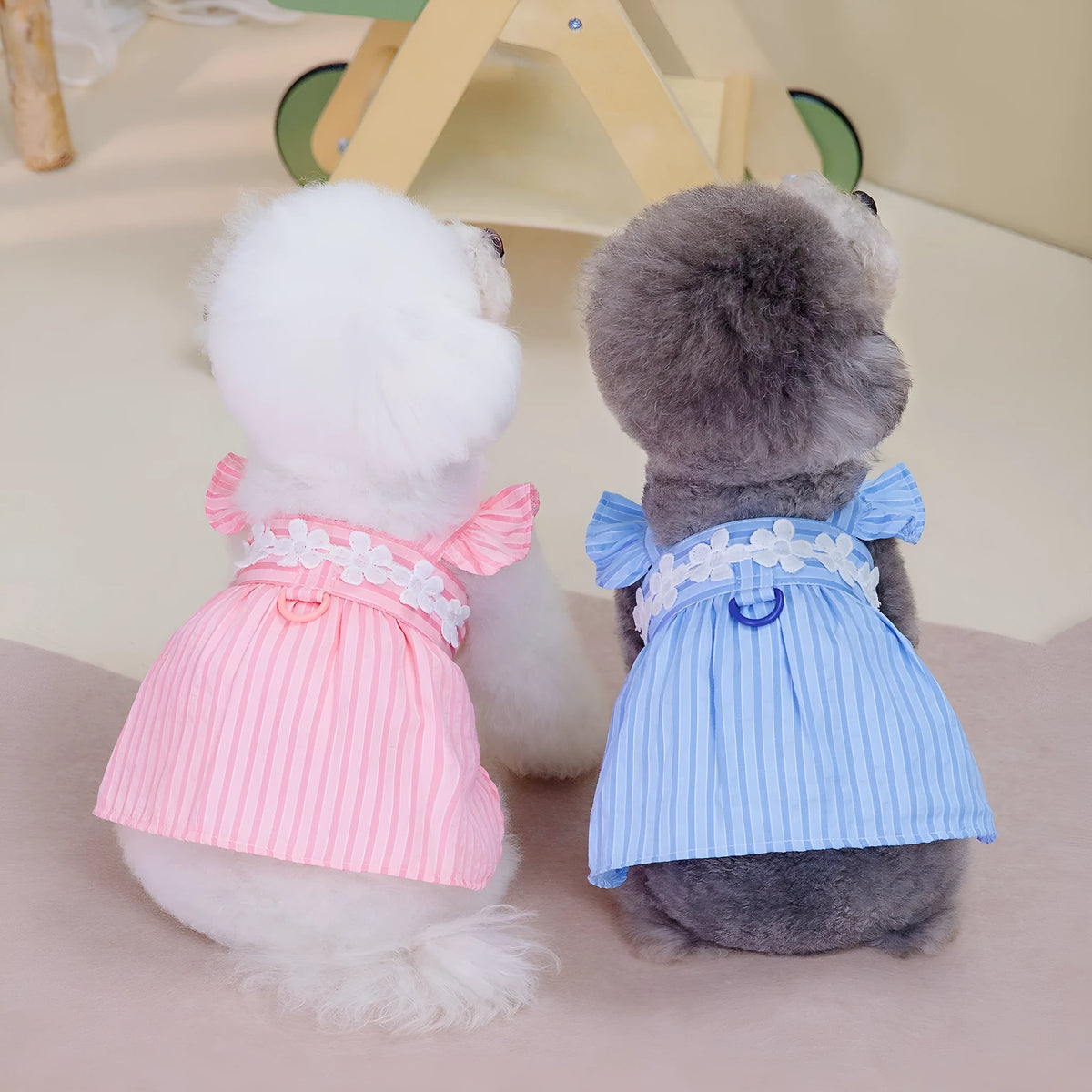 Pink and blue stripe vertical stripe princess style dog dress on female dog