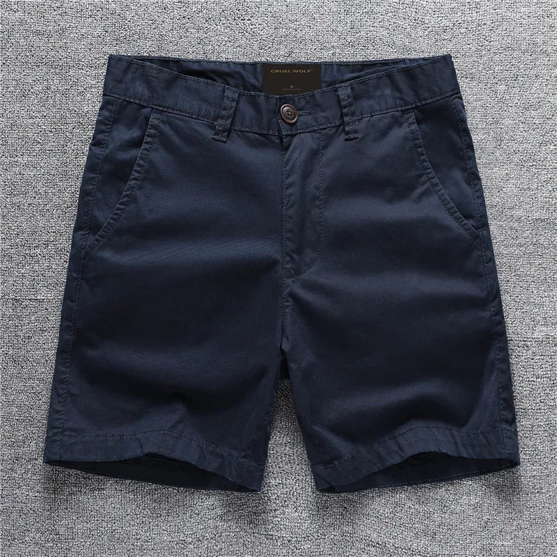 Cotton camouflage work shorts with mid-waist design and zip fly closure