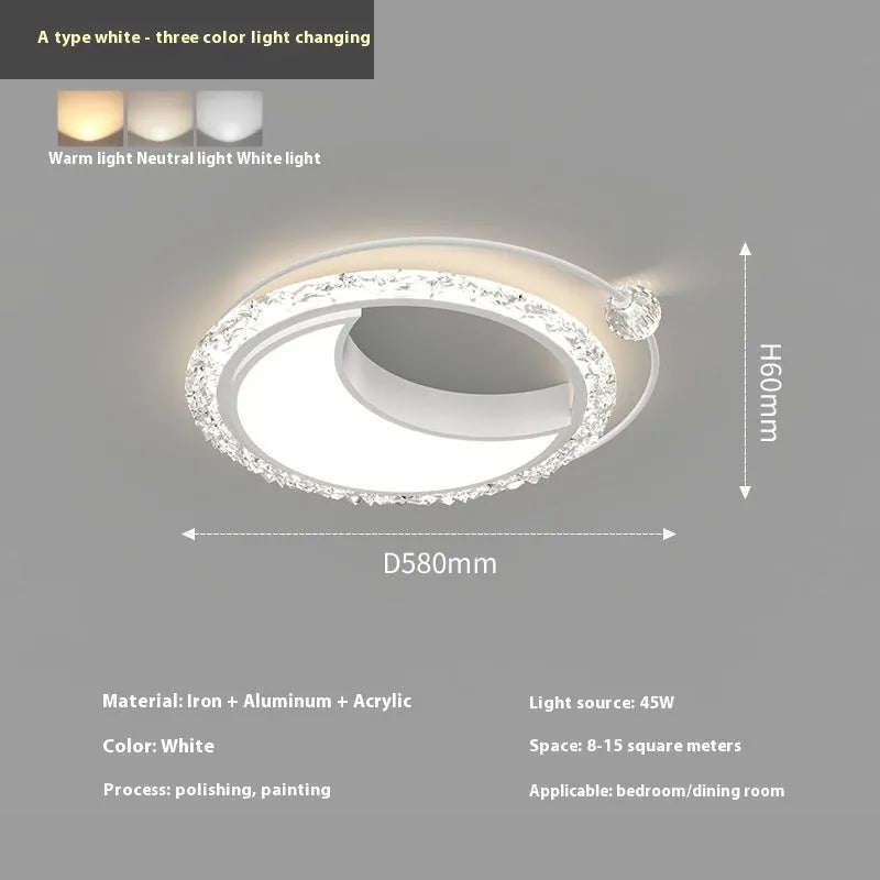 Modern round iron ceiling lamp in black finish mounted on a white ceiling.