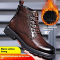 Low heel leather ankle boots with square heel and patent leather construction in black colour