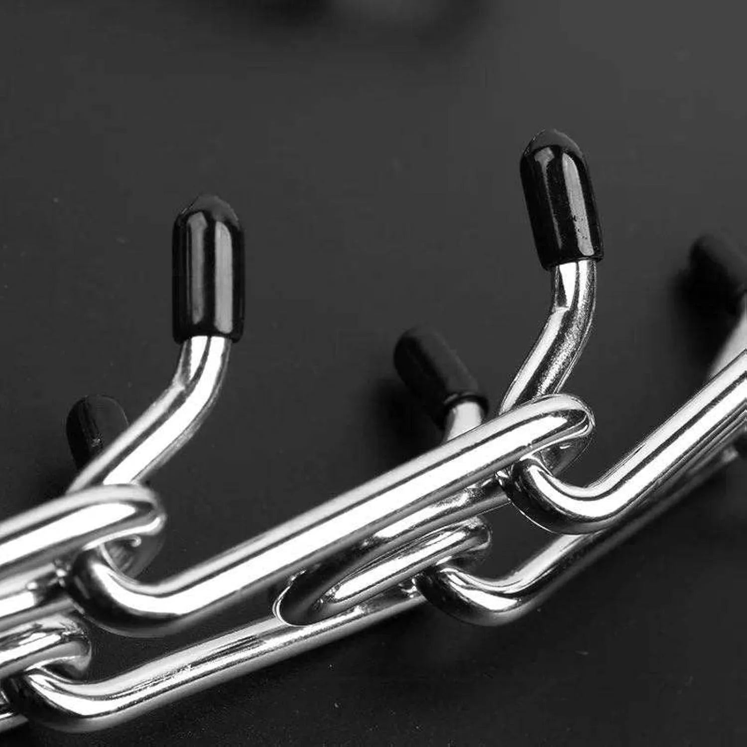Stainless steel dog prong training collar with round head links and rubber tips in adjustable sizes