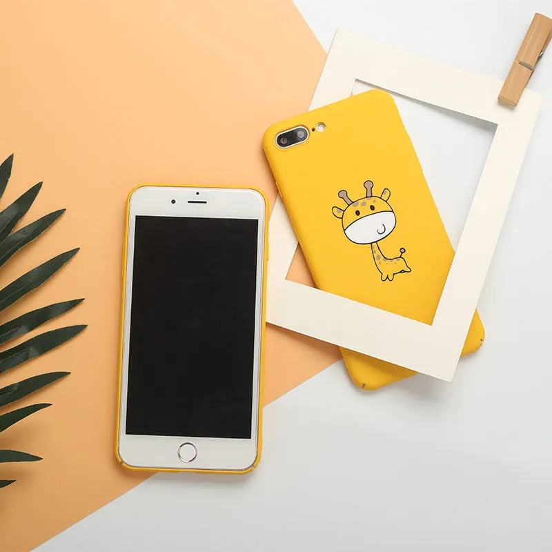 Yellow patterned hard plastic phone case for iPhone models with raised protective edges.