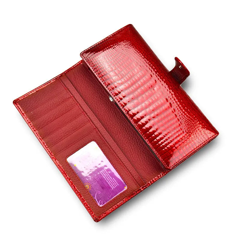 Women's leather coin purse with crocodile pattern in wine red colour