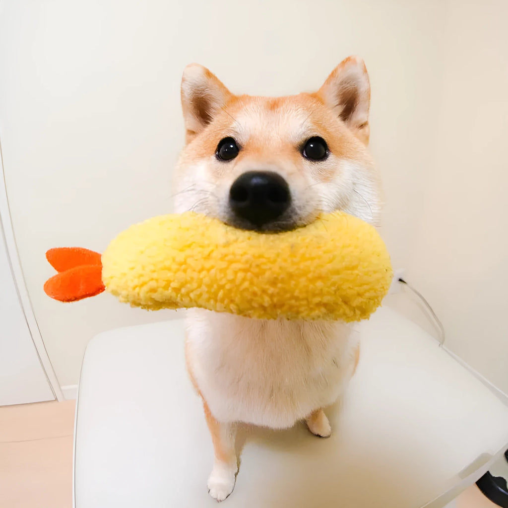 Yellow plush fried shrimp tempura squeaky dog toy with built-in squeaker