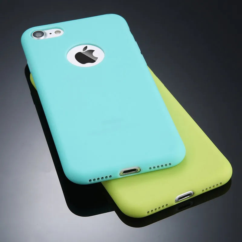 Soft plain silicone TPU phone case for iPhone in candy colours like blue, pink, and red.
