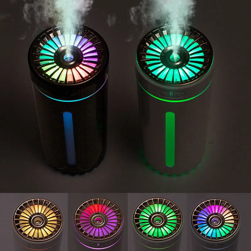 Portable black USB humidifier with colourful lights on car cup holder