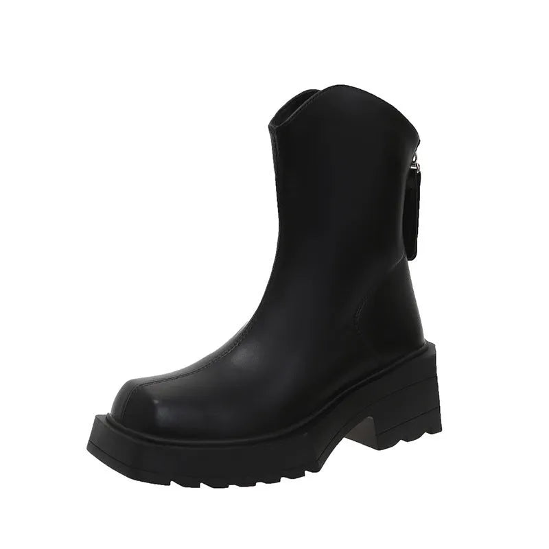 Black women's platform Martin boots with a square toe, high heel, and back zipper on a neutral background.