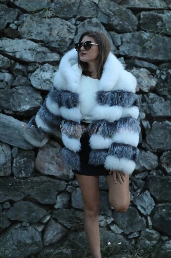 Women's loose-fit artificial fur hooded coat in street fashion style.
