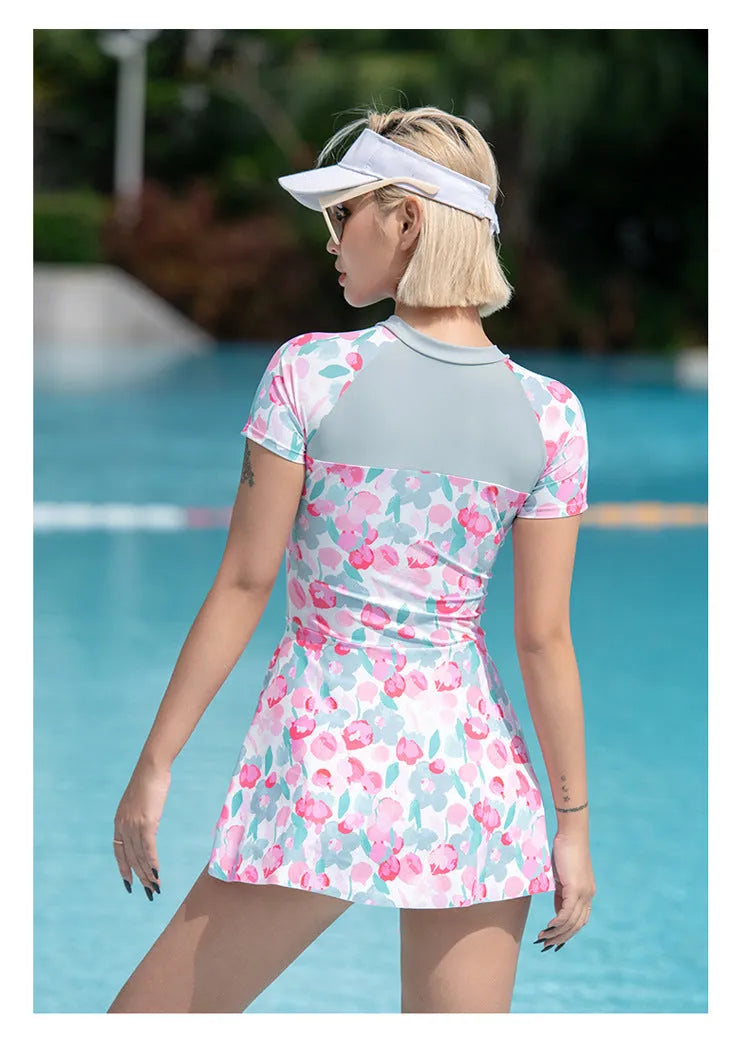 Plus size printed one-piece swimsuit for women in polyester fabric, sizes up to 3XL.