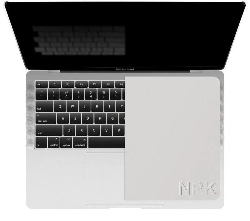 Grey keyboard dust cloth resting on a laptop keyboard, universal fit for 13-inch and 16-inch models