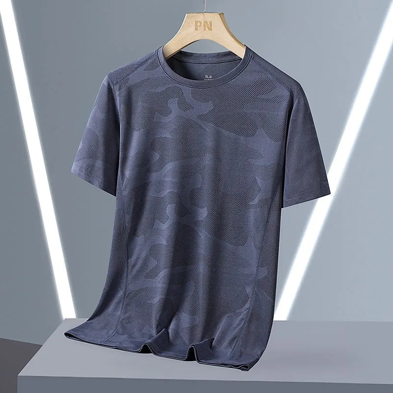 Men's camouflage pattern short sleeve t-shirt in plus sizes on a hanger.