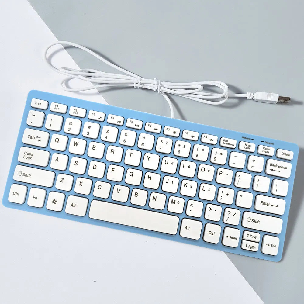 Mini USB wired keyboard for laptops in black, white, pink, or blue colours with 1.3 metre cable