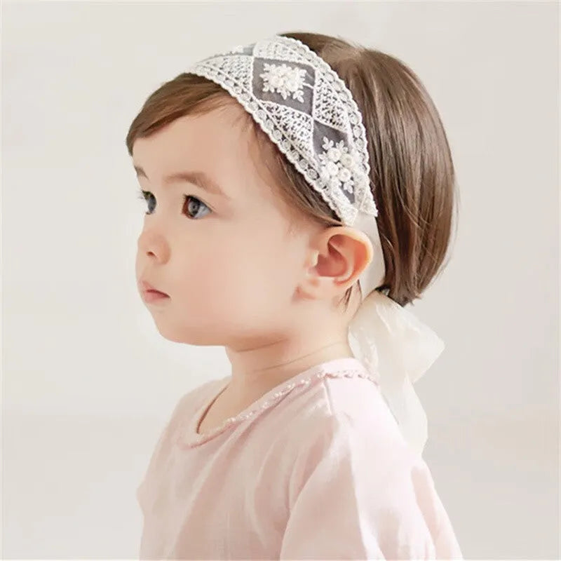 Baby girls headband with double bow-knot and lace floral design in soft cloth material