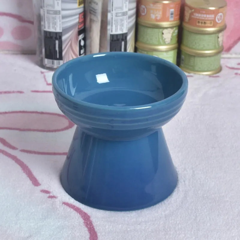 Black ceramic pet bowl with a high foot and neck protector to prevent tipping, shown with flat and slanted rim options.