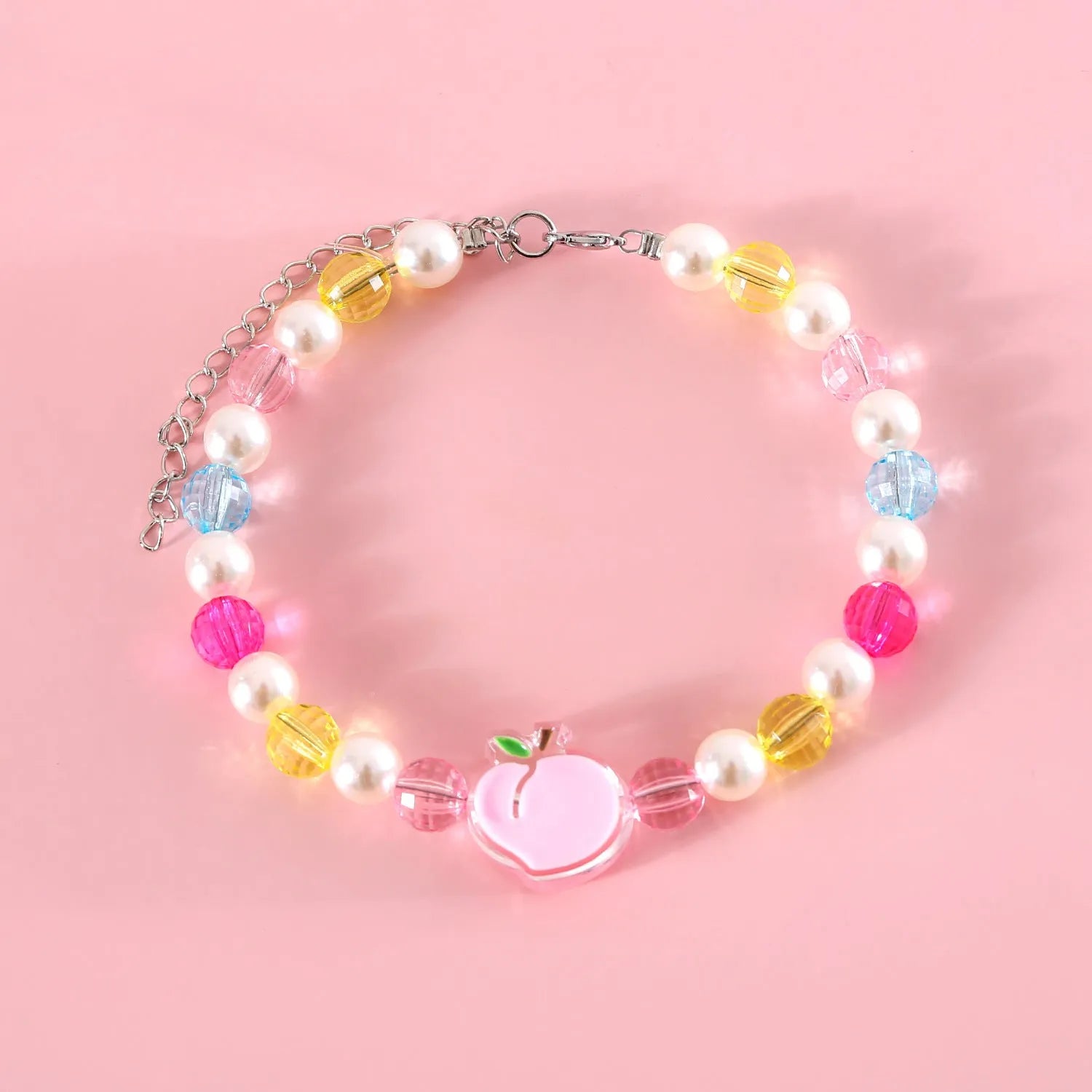 Colourful plastic bead cat necklace with small flower pattern on adjustable cord