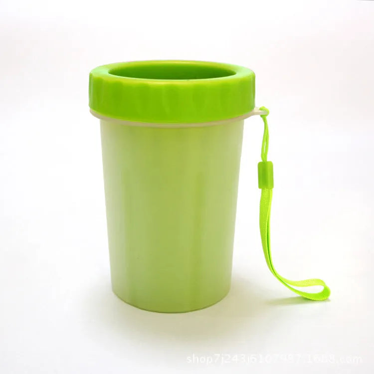 Dog paw cleaner with soft silicone bristles, BPA free, flat bottle mouth, in pink, blue or green, sizes S and L.