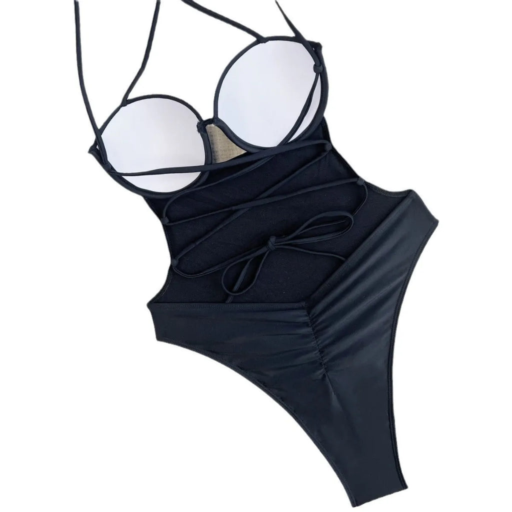Black one-piece bikini-style swimsuit for women on a hanger.