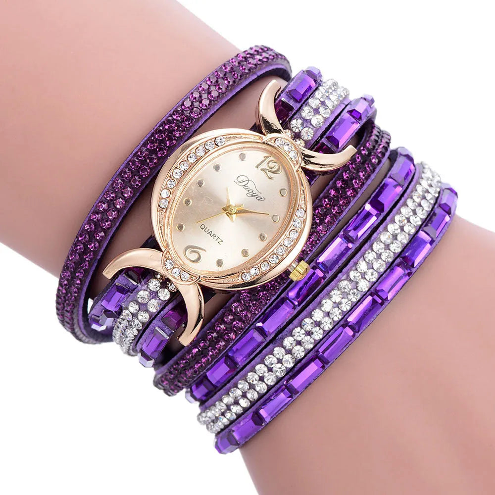 New casual rhinestone watch for women with round stainless steel case, leather band, and analog quartz movement