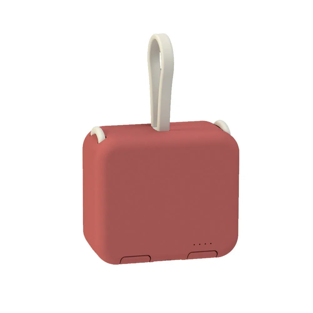 Handbag clip power bank in blue, green, red, or white showing phone stand function and charging ports