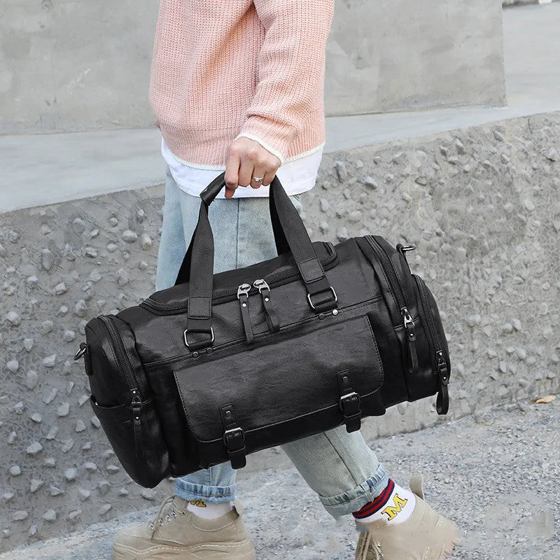 Black PU travel bag with separate shoe compartment, dimensions 52cm x 19cm x 27cm