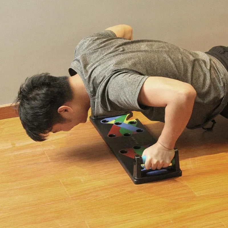 Power Press Push Up Board Nine System colour-coded ABS plastic board with blue red yellow green zones for chest shoulders back triceps exercises