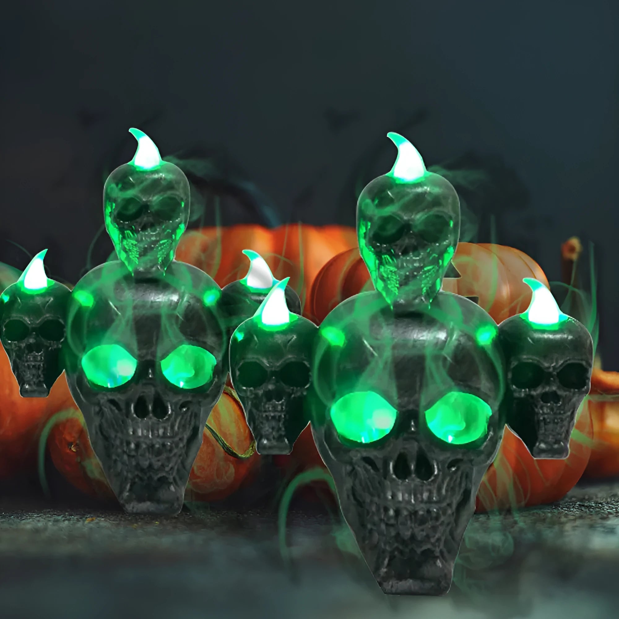 Halloween skull ornament with LED light, gold and silver, plastic, 14x12x9cm, on dark background