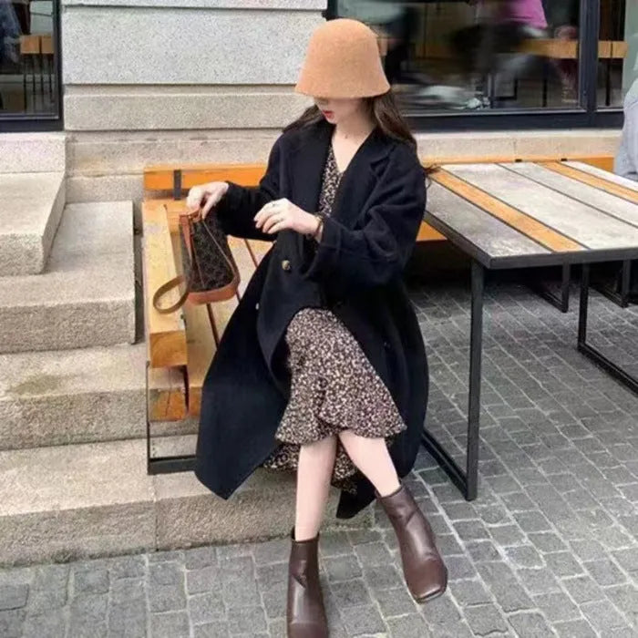 Women's high-grade woolen coat long sleeve in black colour, conventional sleeve design for casual winter wear