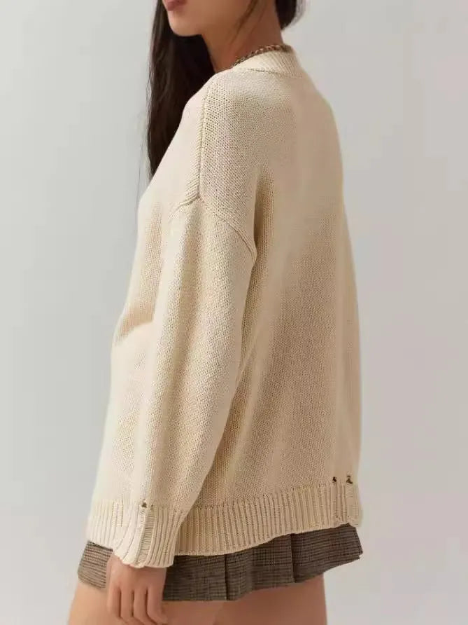 Women's milky white round neck acrylic sweater with jacquard texture, loose fit, long sleeves