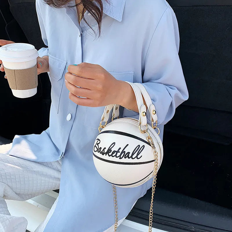 Small round women's handbag in PU with zipper closure, available in black soccer colour pattern, front view