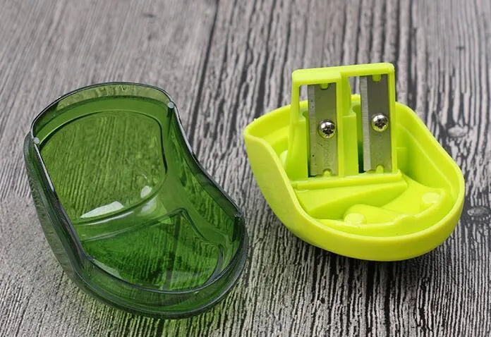 Double hole pencil sharpener with solid closed hole design, for normal and thick pencils, random colour
