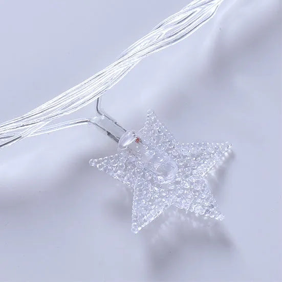 LED five-pointed star string lights with copper wire in warm white colour