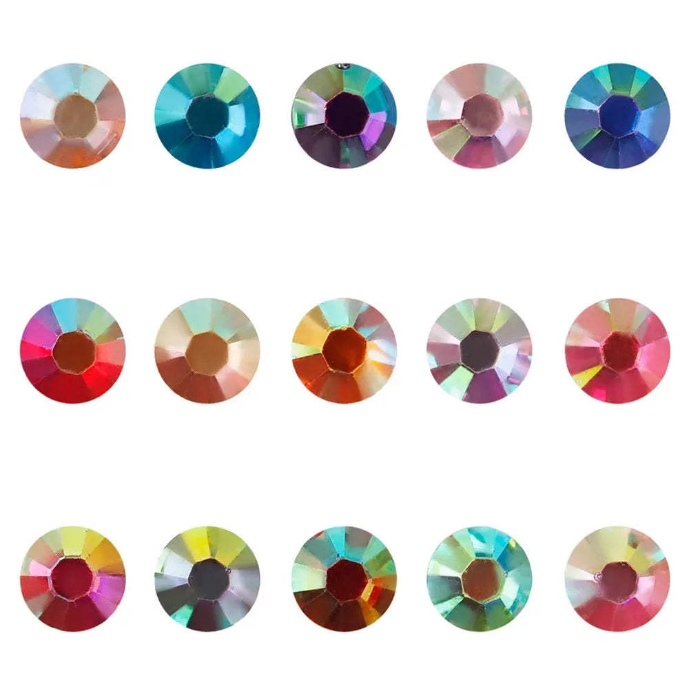 Plastic resin nail art rhinestones in multiple colours with electroplated surfaces arranged in mesh packaging
