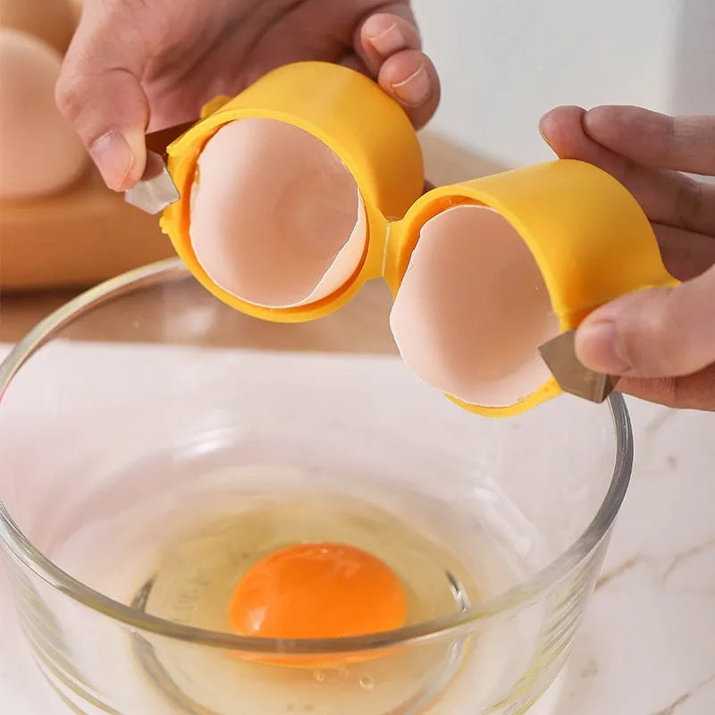 Kitchen egg shell opener and beater tool in orange red, pink or yellow colour weighing 35g