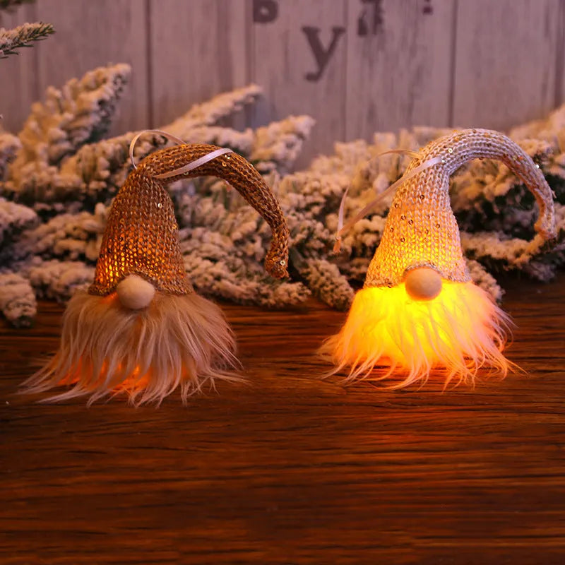 Handmade Swedish forester gnome LED tree pendant with warm light and snowflake details, 8x20 cm, beige colour