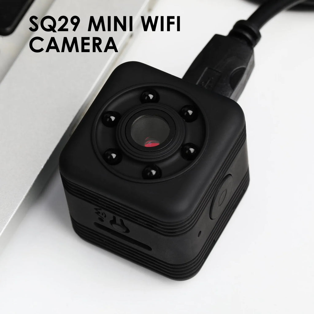 Black SQ29 waterproof sports camera showing MicroUSB port and TF card slot.