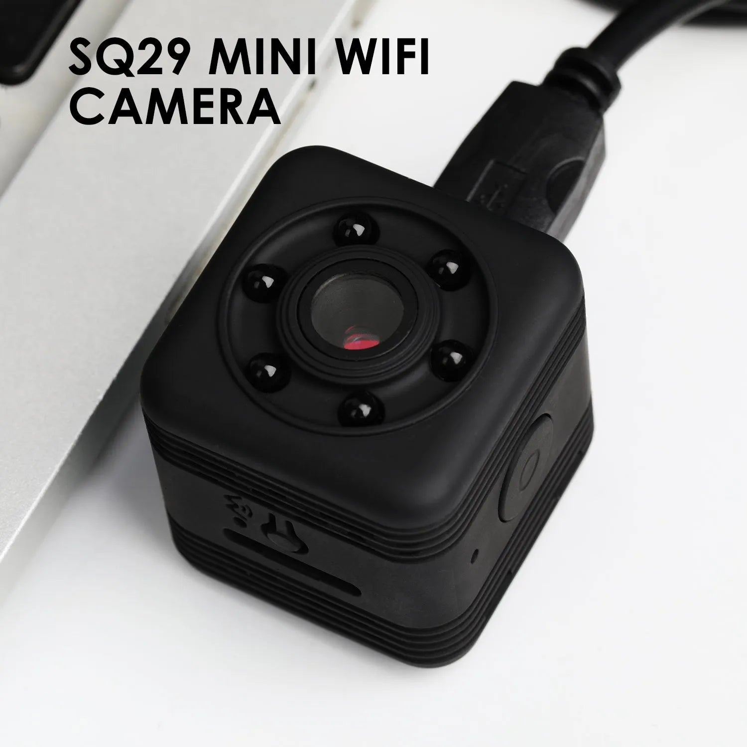 Black SQ29 waterproof sports camera showing MicroUSB port and TF card slot.