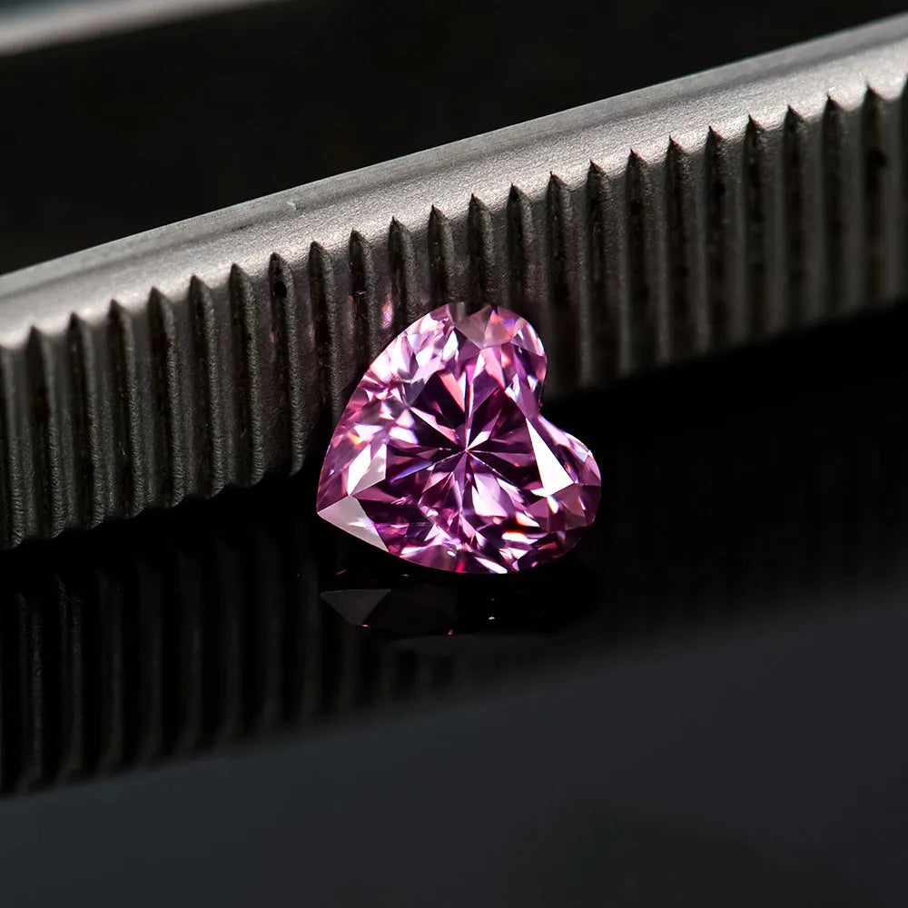 Lemon yellow heart-shaped moissanite gemstone showing symmetrical cut and warm colour