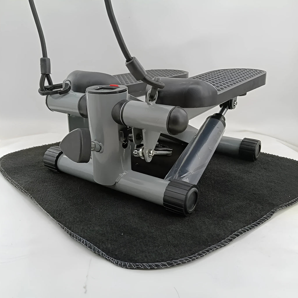 Silver grey hydraulic mini treadmill for waist slimming and home workouts.