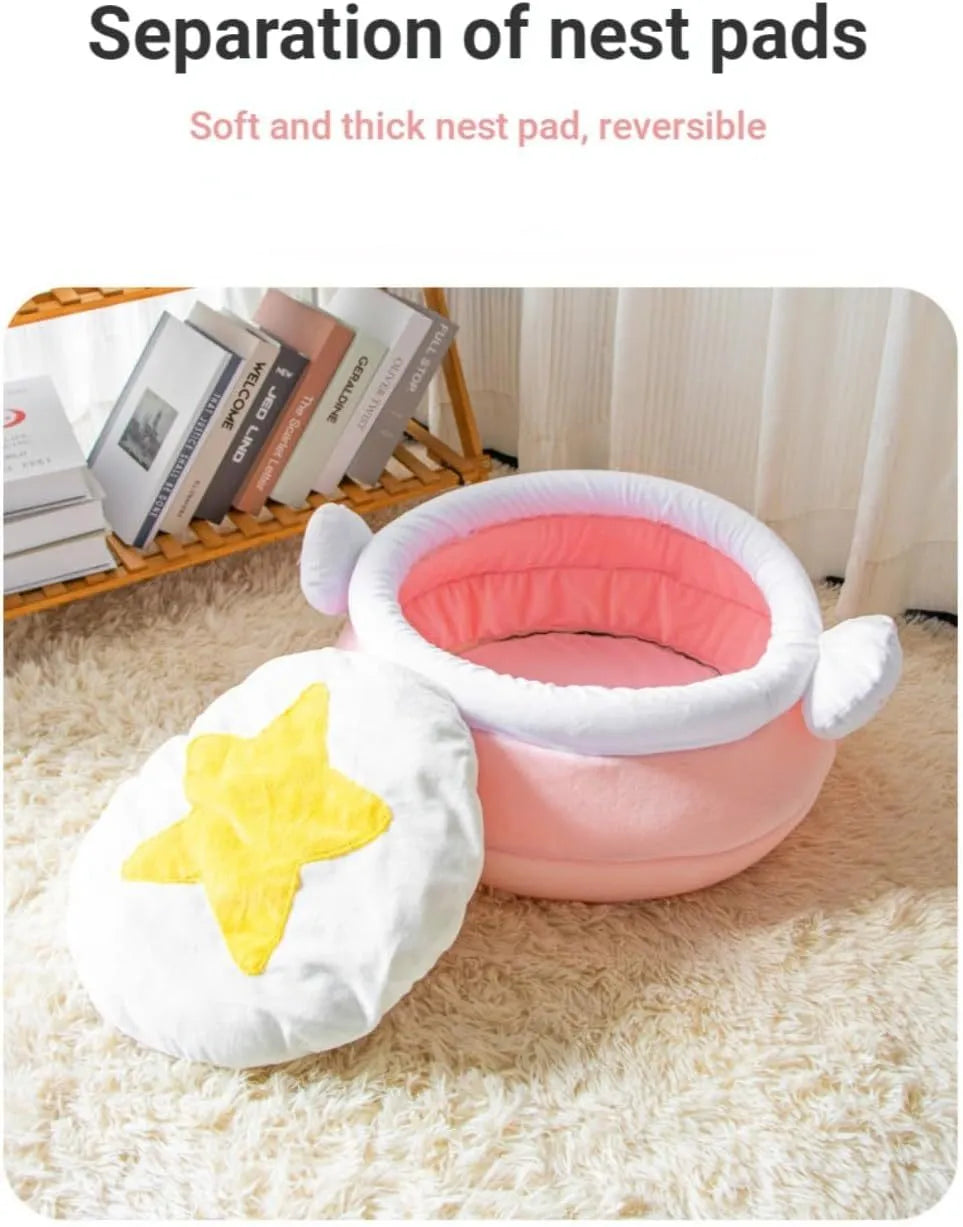 Pink honey pot shaped cat bed with a removable circular cushion inside for a small pet.