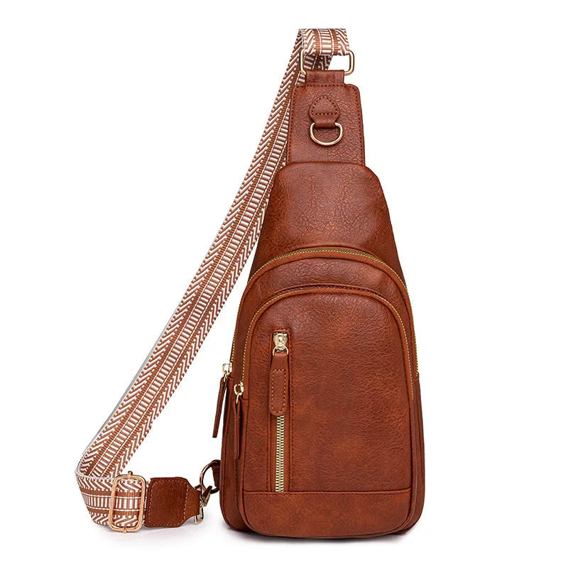 Women's soft PU chest bag in beige colour showing open pocket and crossbody strap