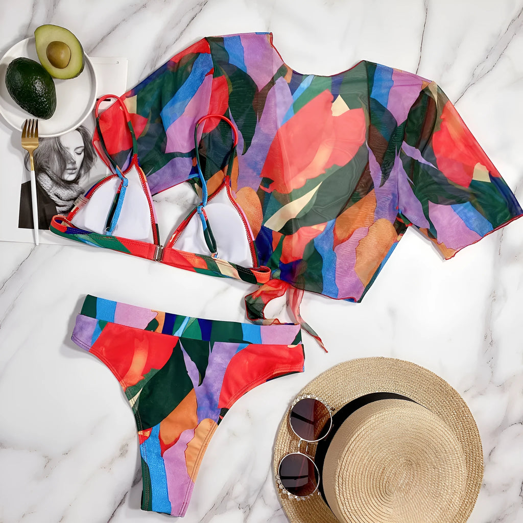 Red women's split bikini swimsuit made from nylon fabric.