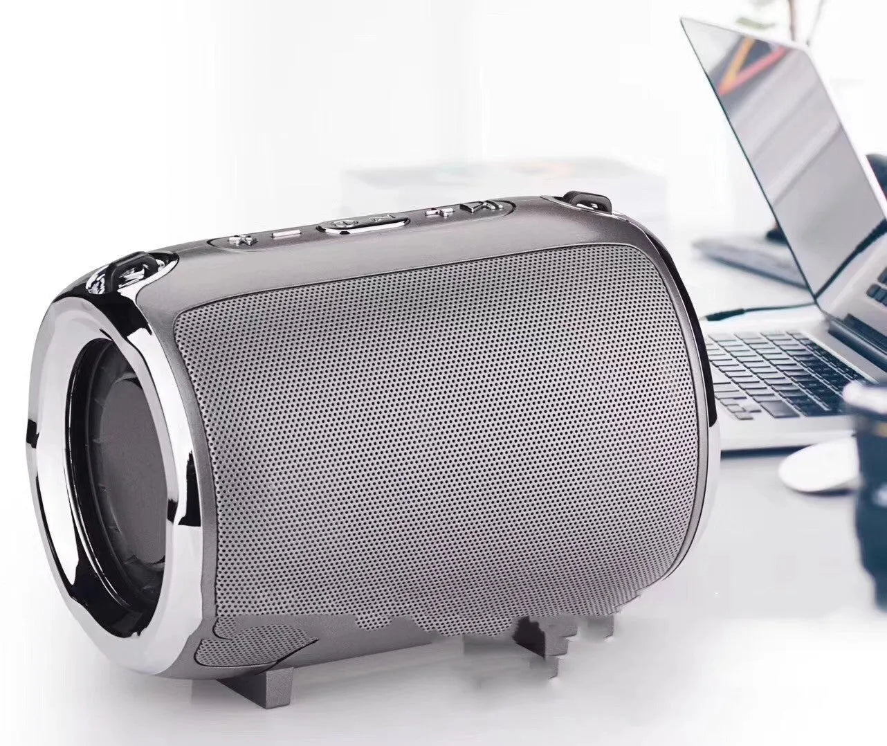 Portable metal subwoofer with 2.1 channel audio, battery power, Bluetooth, USB and FM inputs in black blue golden red silver colours