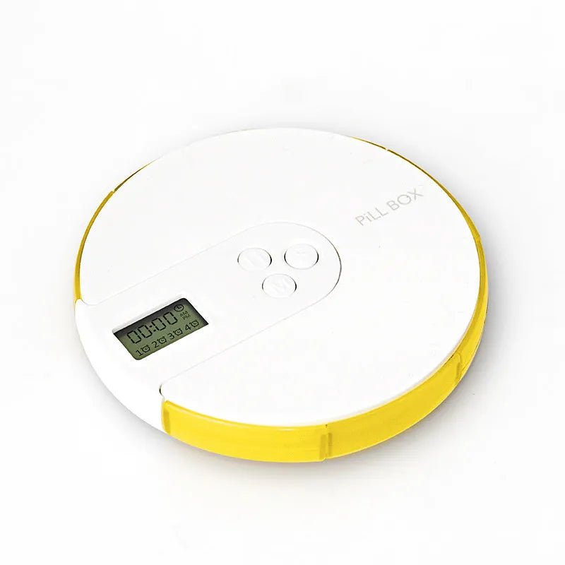 Seven-compartment alarm clock pill dispenser in blue, showing timer display and storage lids.
